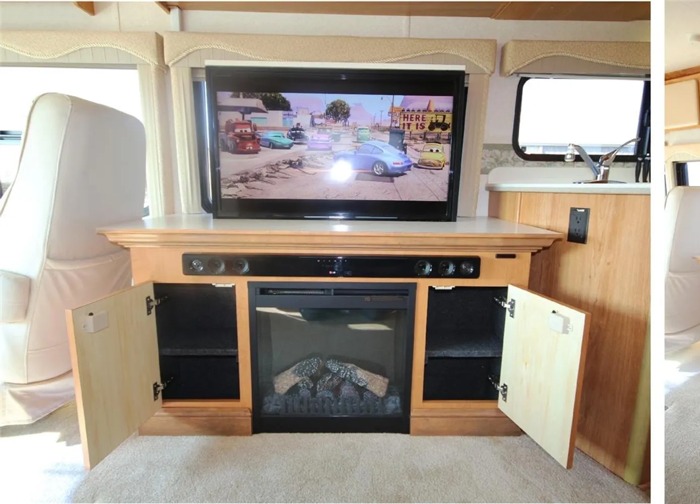 RV media center with integrated TV, fireplace, and cabinet storage